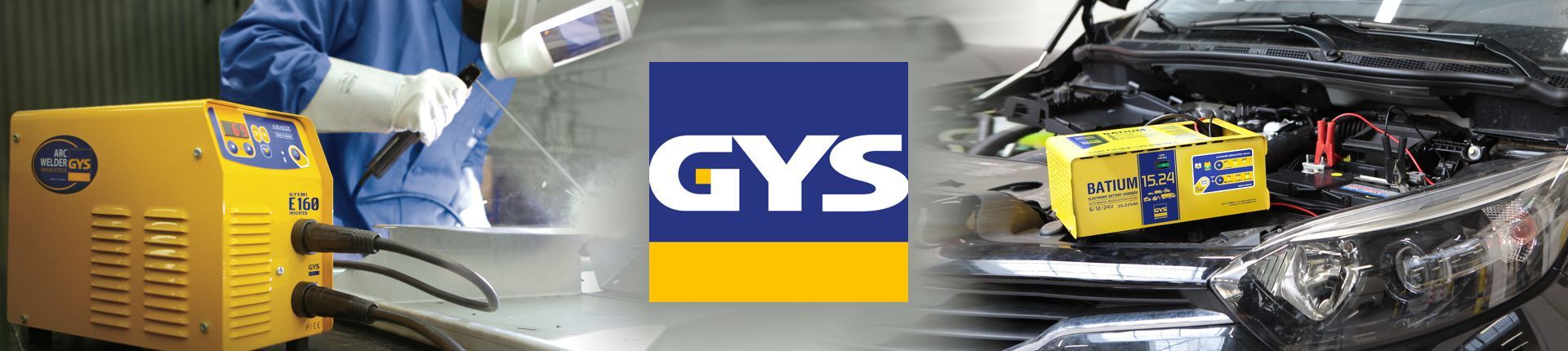 Mann mit Schweißmaske schweißt mit einem Gys Schweißgerät Mann mit Schweißmaske schweißt mit einem Gys Schweißgerät