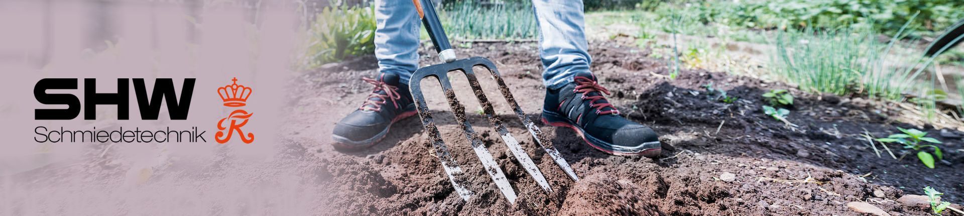 SHW Gabel beim Umgraben in Nahaufnahme SHW Gabel beim Umgraben in Nahaufnahme
